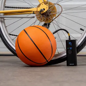 Auto Air Pump on grey background